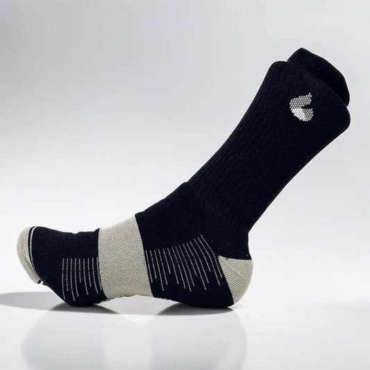 Black and grey tennis crew socks with Active Arc compression, seamless toe design, and ankle protection for enhanced performance and comfort.